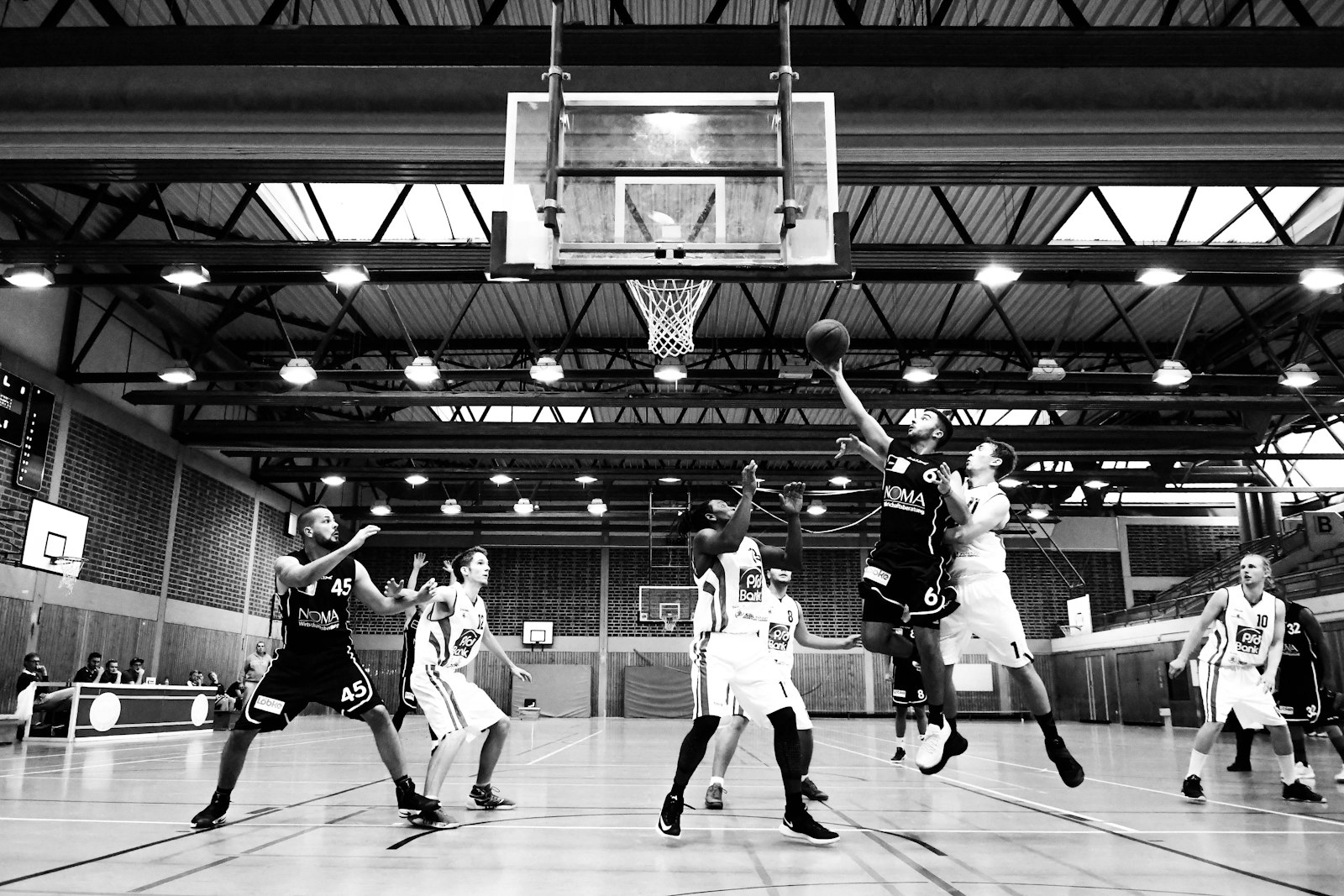 Classic basketball moment in grayscale