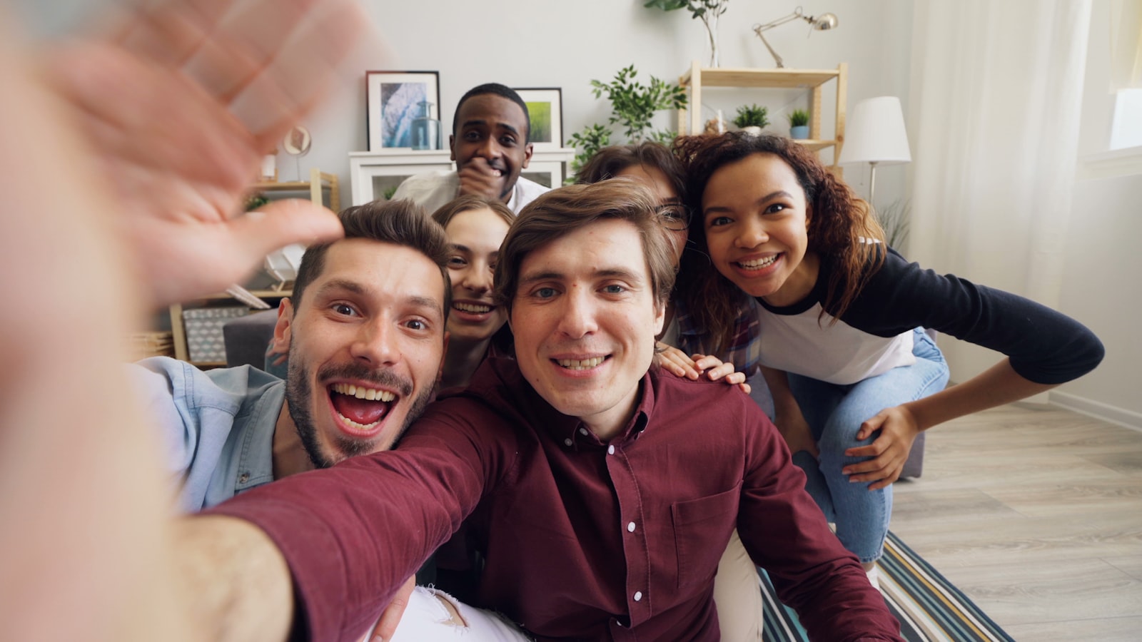 Friends together in a living room